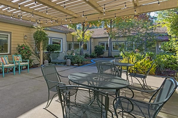 Outdoor seating area with garden view