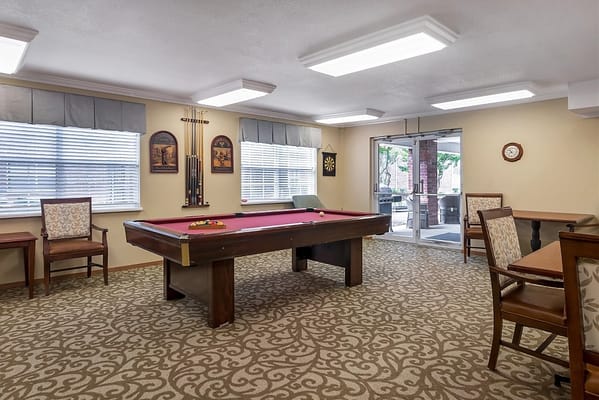 Common area with pool table and seating