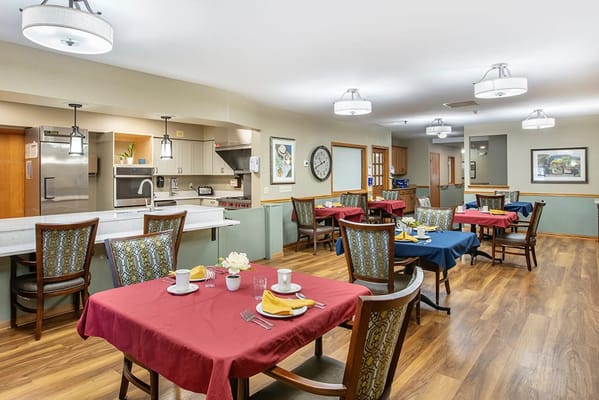 Dining area with tables set for a meal