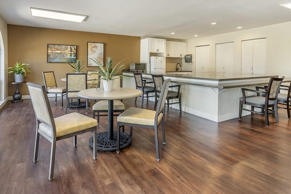 Bright common area with seating and decor