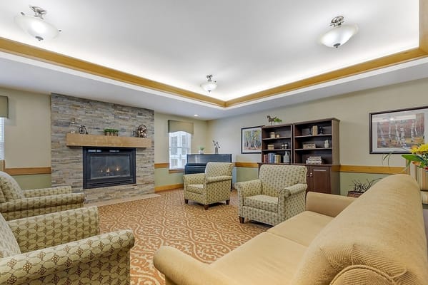 Cozy common area with seating and fireplace