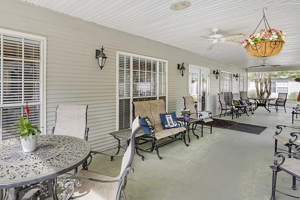 Outdoor seating area with tables and chairs