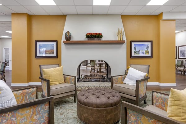 Comfortable lounge with seating and fireplace