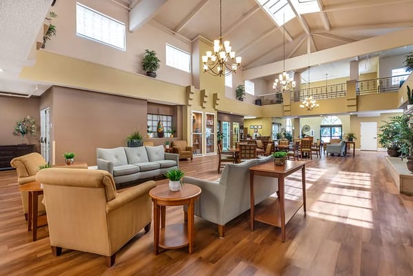 Bright common area with seating and natural light