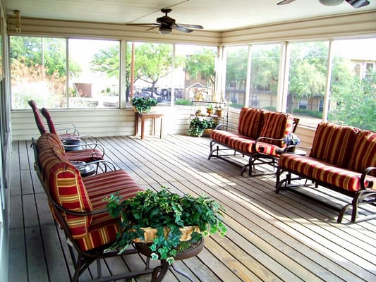 Outdoor seating area with comfortable chairs and plants