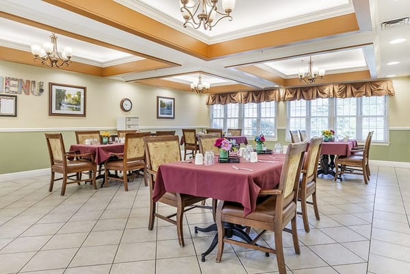 Dining area with tables set for a meal