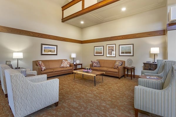 Cozy common area with seating and artwork