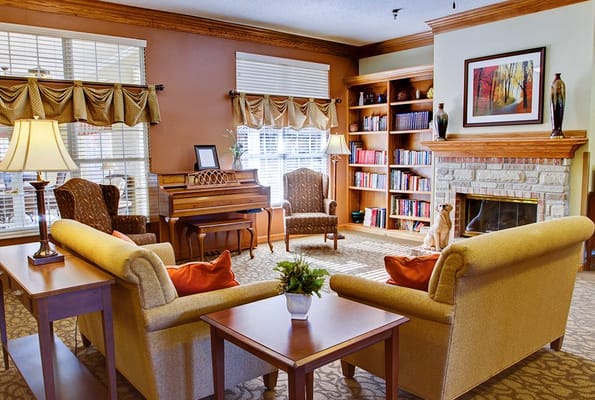 Cozy common area with comfortable seating and a fireplace