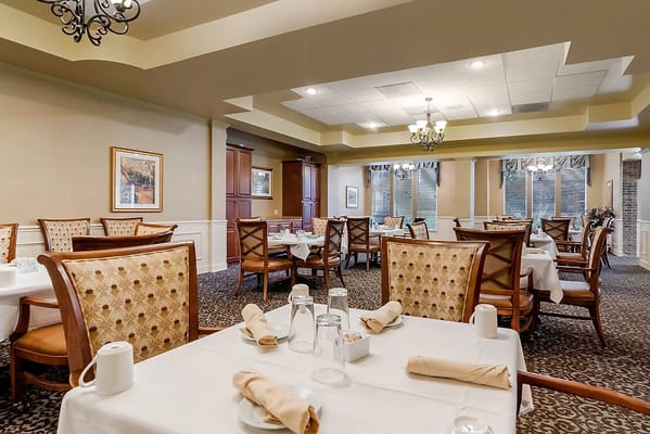 Dining area with tables set for service