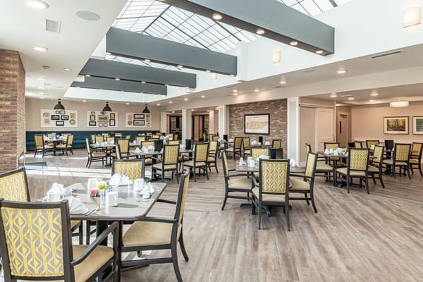 Bright dining area with tables set for meals