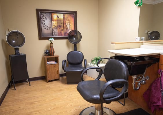 Salon chairs and styling equipment in a senior living facility
