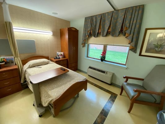 Cozy resident room with a bed and window