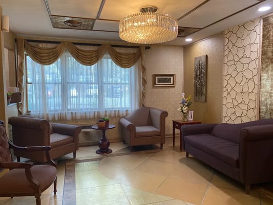 Cozy lounge area with comfortable seating and natural light