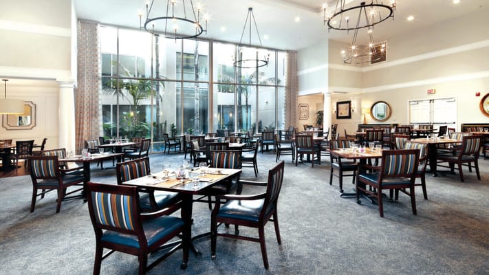 Elegant dining room with tables and chairs