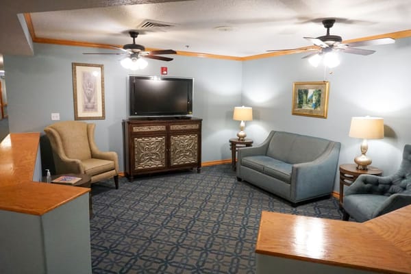 Comfortable living room with seating and television