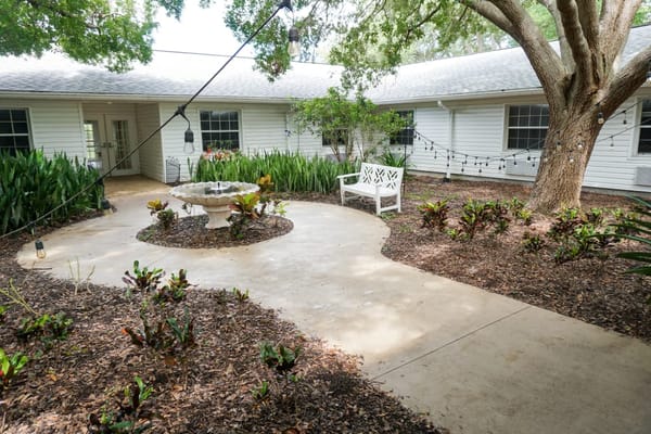 Beautiful courtyard with a fountain and seating