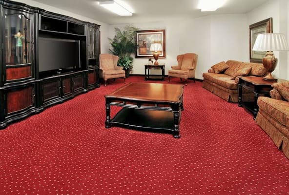 Common area with seating and a television