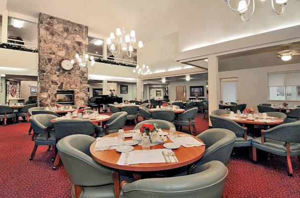 Dining area with tables set for a meal