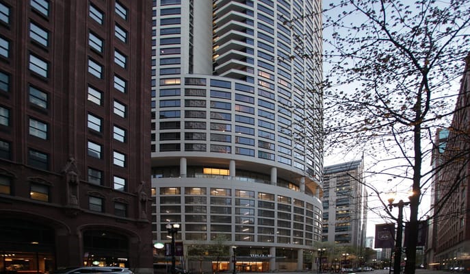 The Clare senior living facility in Chicago with surrounding buildings.