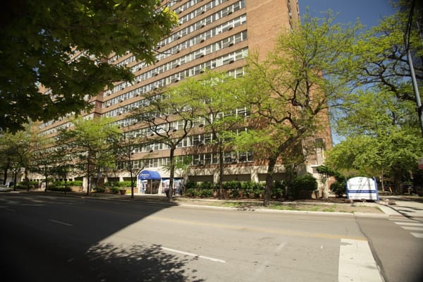Exterior view of the Brookdale Lake View building with trees