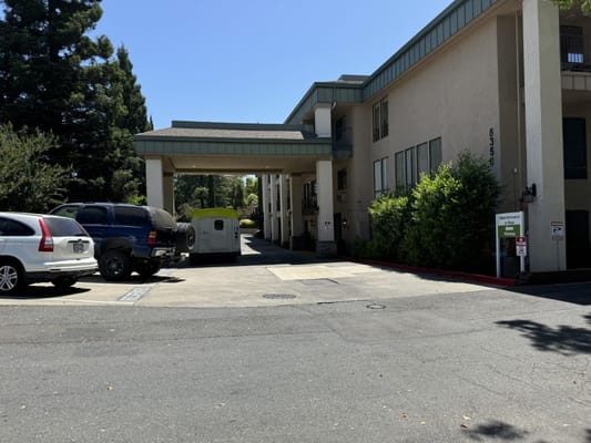Exterior view of Atria Carmichael Oaks facility entrance