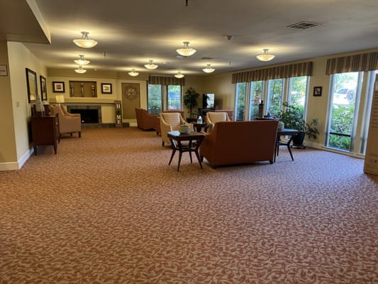 Common area with seating and large windows