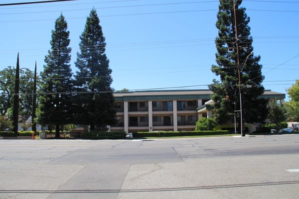 Exterior view of Atria Carmichael Oaks from the street