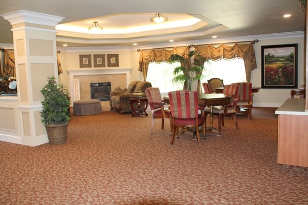 Common area with seating and fireplace