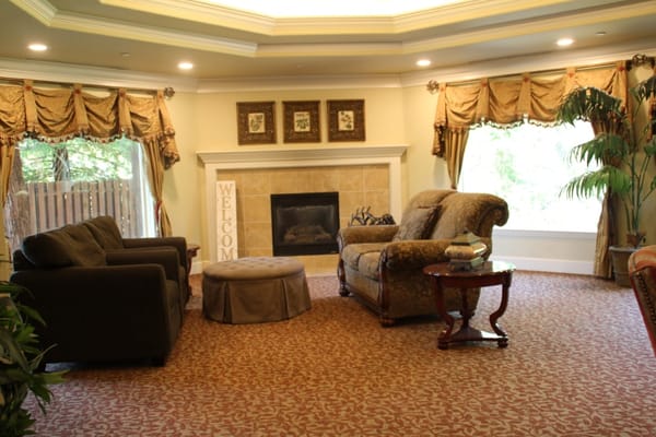 Cozy common area with comfortable seating and fireplace