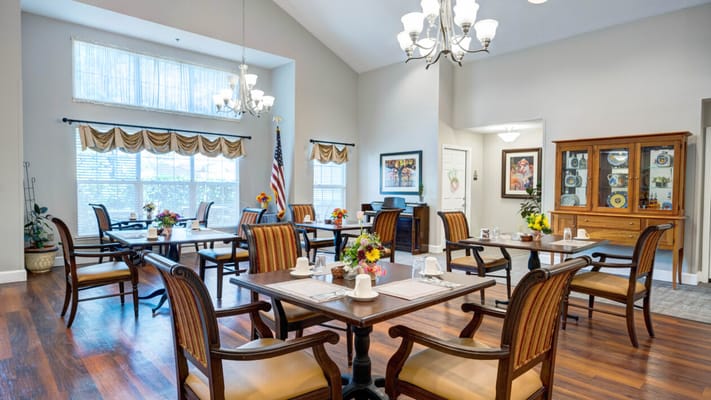 Dining area with tables set for a meal