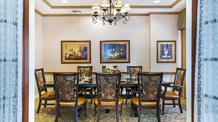 Interior view of a dining room with a large table