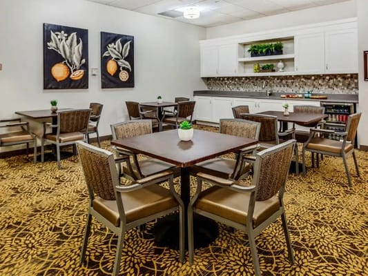 Bright and inviting dining area with tables and chairs