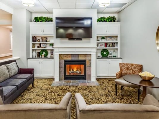 Cozy common area with fireplace and seating