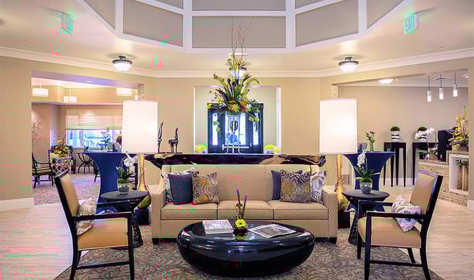 Interior of a welcoming common area with seating and decor