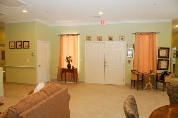 Bright common area with seating and decorative features
