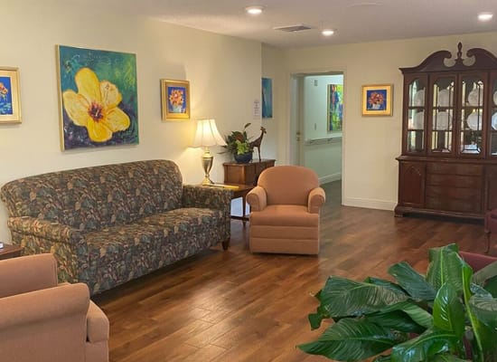 Common area with floral decorations and seating
