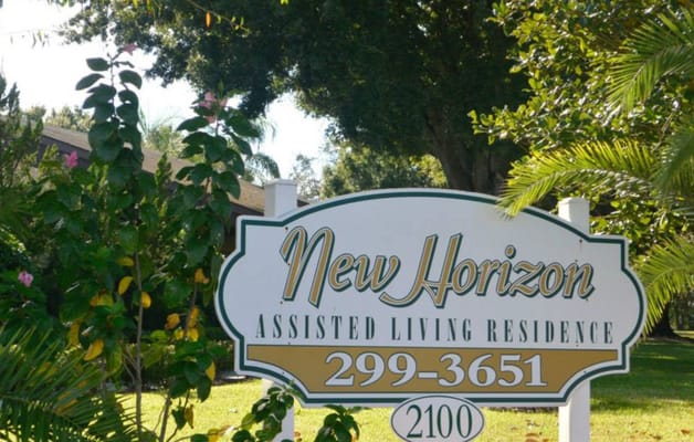 Facility logo sign with name and contact details