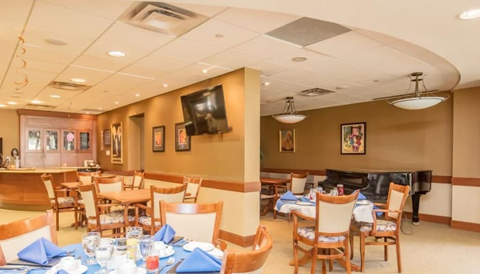 Dining room with tables set for a meal