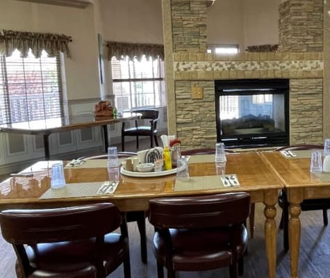 Interior dining area with tables set for a meal