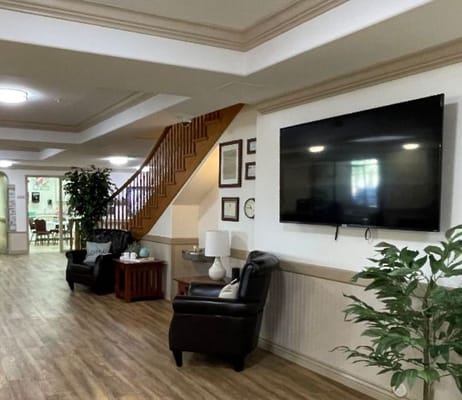 A cozy common area with seating and decor