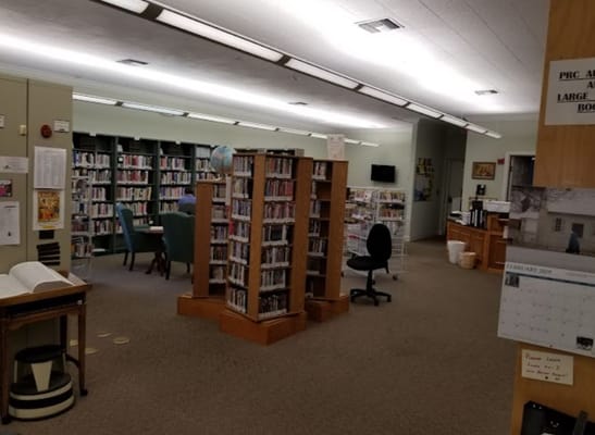Interior of a library with shelves and seating