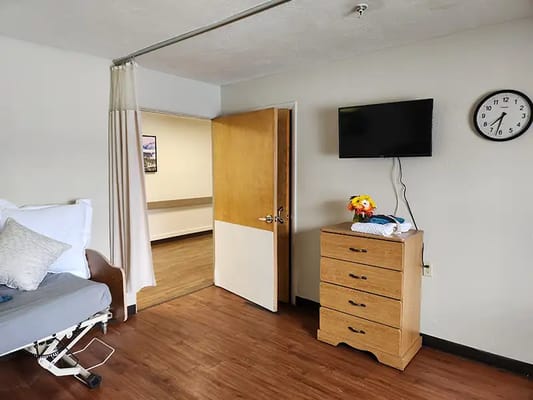Interior view of a resident room with furniture