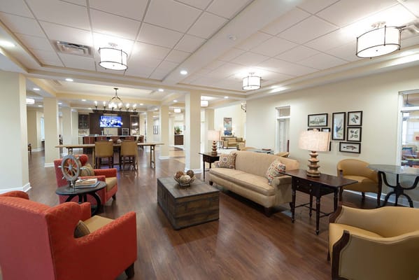 Bright common area with comfortable seating and decor