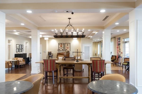 Bright and welcoming common area with seating and decor