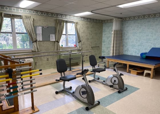 Physical therapy equipment in an activity room