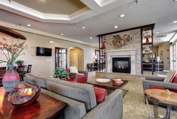 Common area with seating and a fireplace