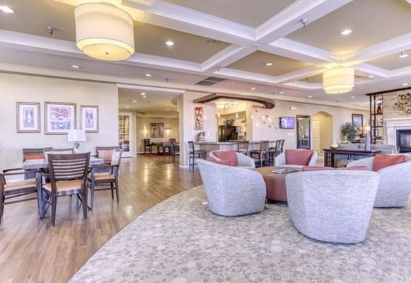 Bright common area with comfortable seating and decor