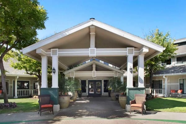 Entrance of a senior living facility with outdoor space