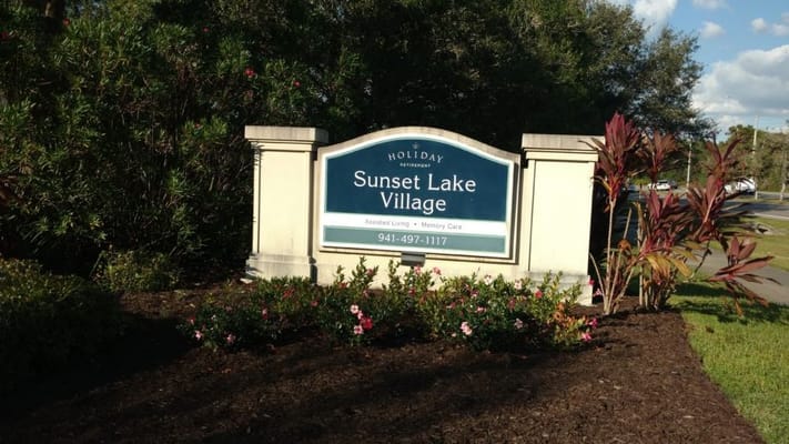 Signage for Sunset Lake Village assisted living facility