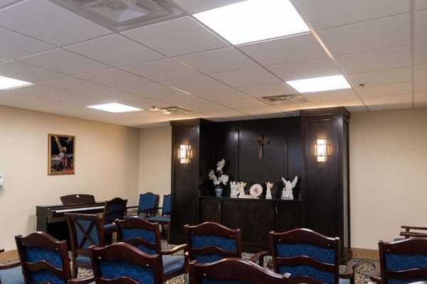Interior of the chapel with seating and decor.